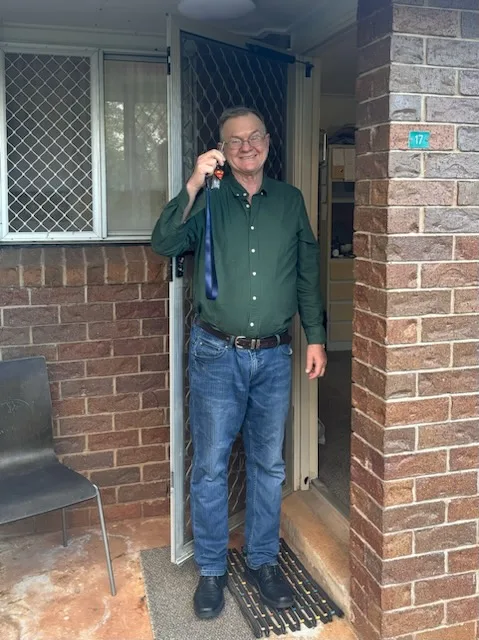 Phillip building independence and confidence in his new home with the support of his care team.